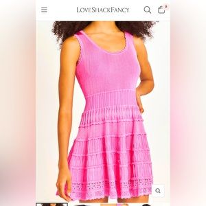 Beautiful pink dress. Fits like a glove. Never worn.